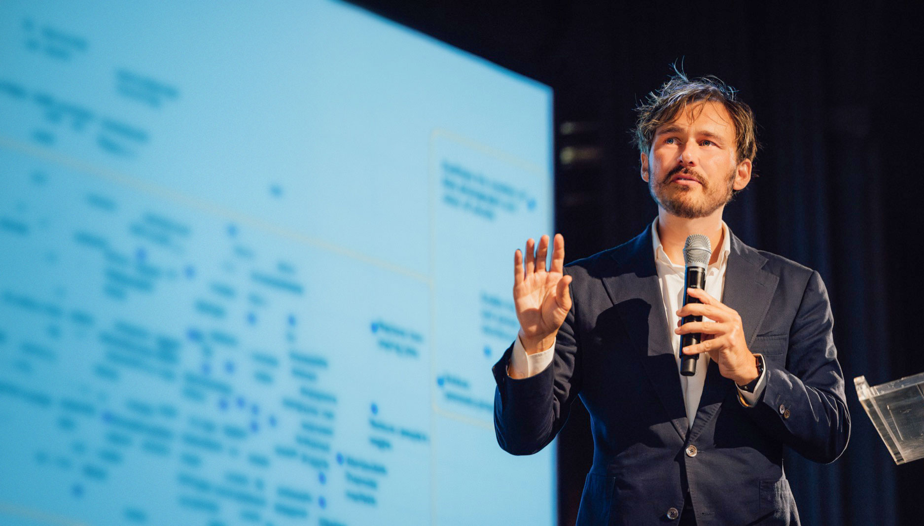 Daniel Stone presenting Narrative Frames methodology at a conference
